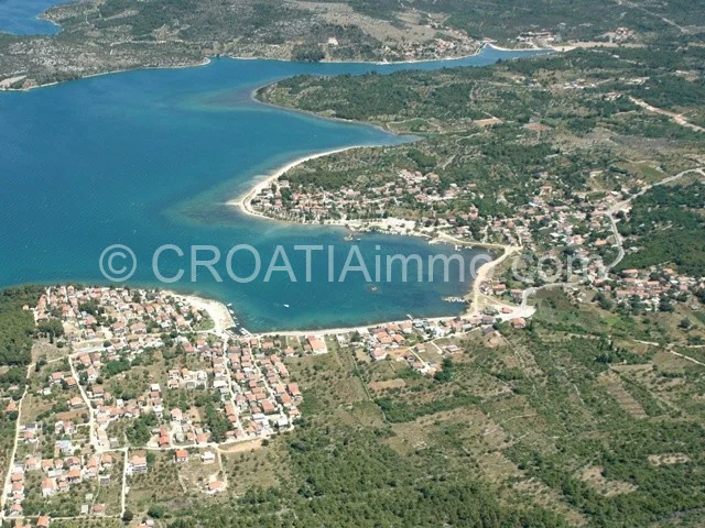 Aerial view of building land with sea view in Bilice