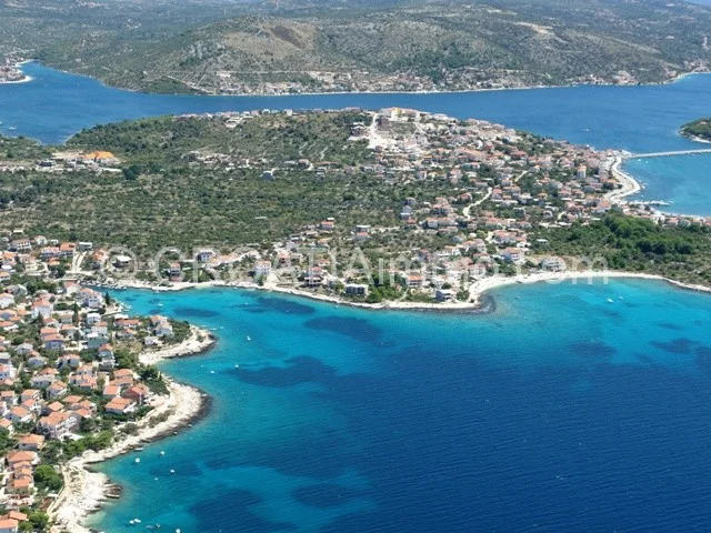 Aerial view of building land with sea view in Rogoznica