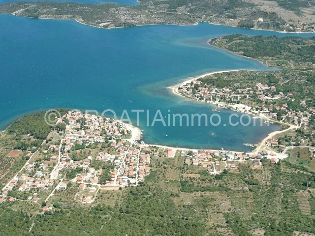 Aerial view of seafront house with garden in Bilice