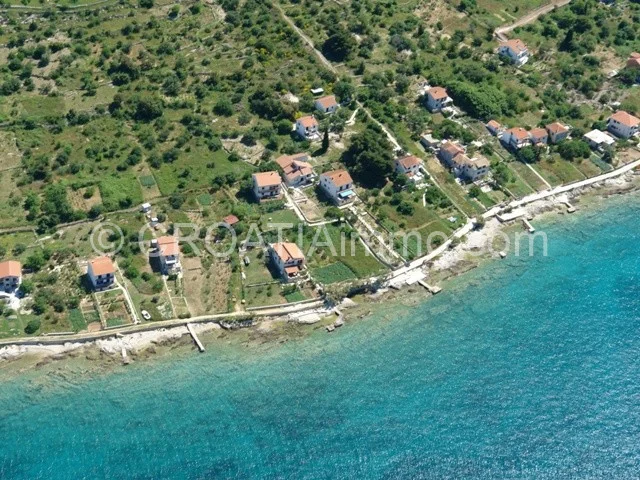Aerial view of house with sea view on Prvic Island