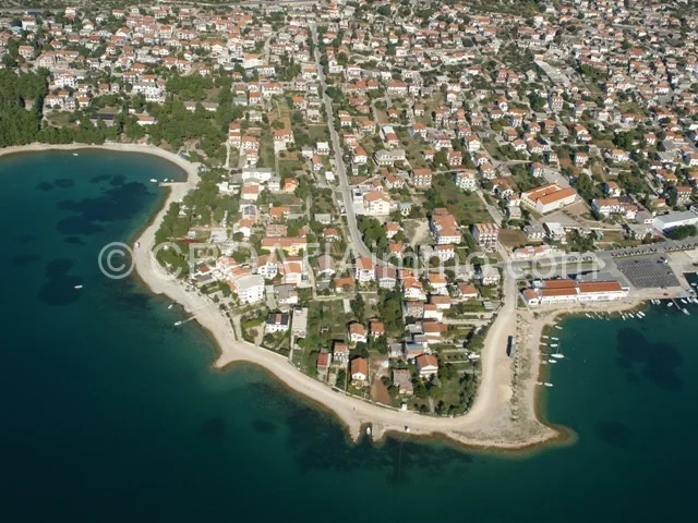 Aerial view of newly built villa with pool with garden in Pirovac